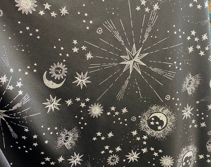 Silver stars and moon on black stretch Spandex Fabric  sold by yard