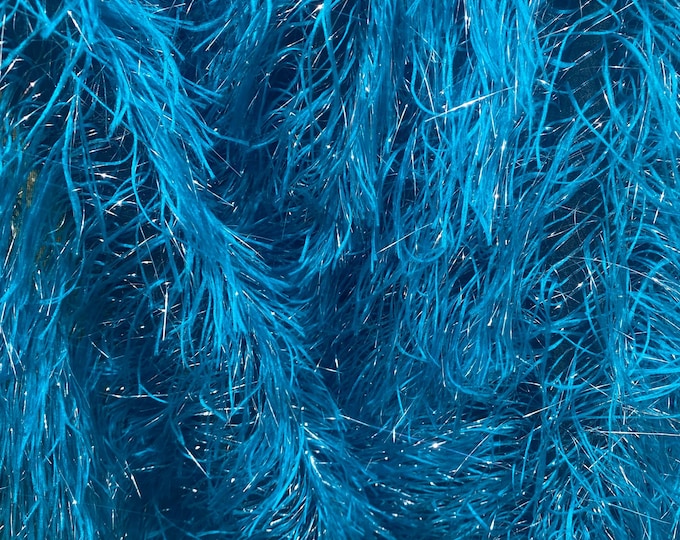 Turquoise feather tinsel on mesh fabric per yard 60" wide