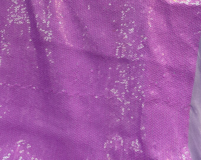 Lavender sequins embroidered glitz on stretch polyester spandex base 2-way 58/60” wide