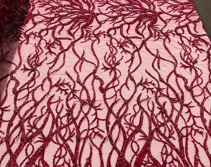 Burgundy Vine with heavy beading on a mesh lace-sold by the yard.