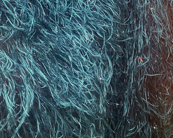 Teal green feather tinsel on mesh fabric per yard 60" wide
