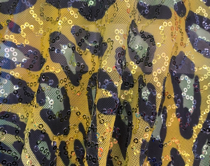 Gold leopard stretch lace with sequins all around 58” wide
