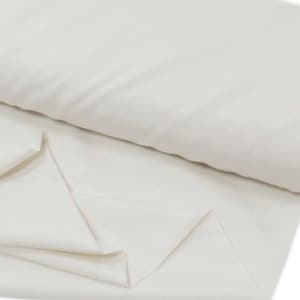 May include: A close-up of a white fabric, folded in half, showing the texture and color of the material.