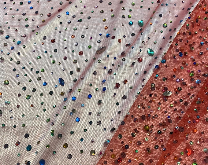 Beaded multicolored, rhinestone gems, on red mesh fabric, 54 inches wide