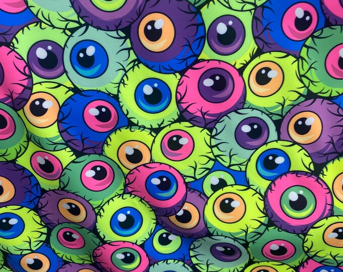 Monster cartoon style eyeballs stretch spandex fabric 58" wide