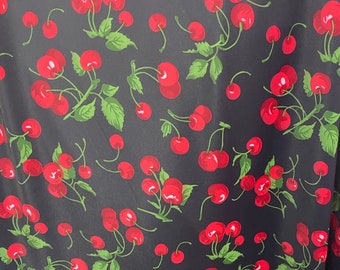 Stretch Spandex cherry on black fabric per yard 60" wide