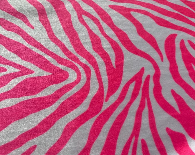 Hot pink on white zebra stretch velvet fabric 58" wide