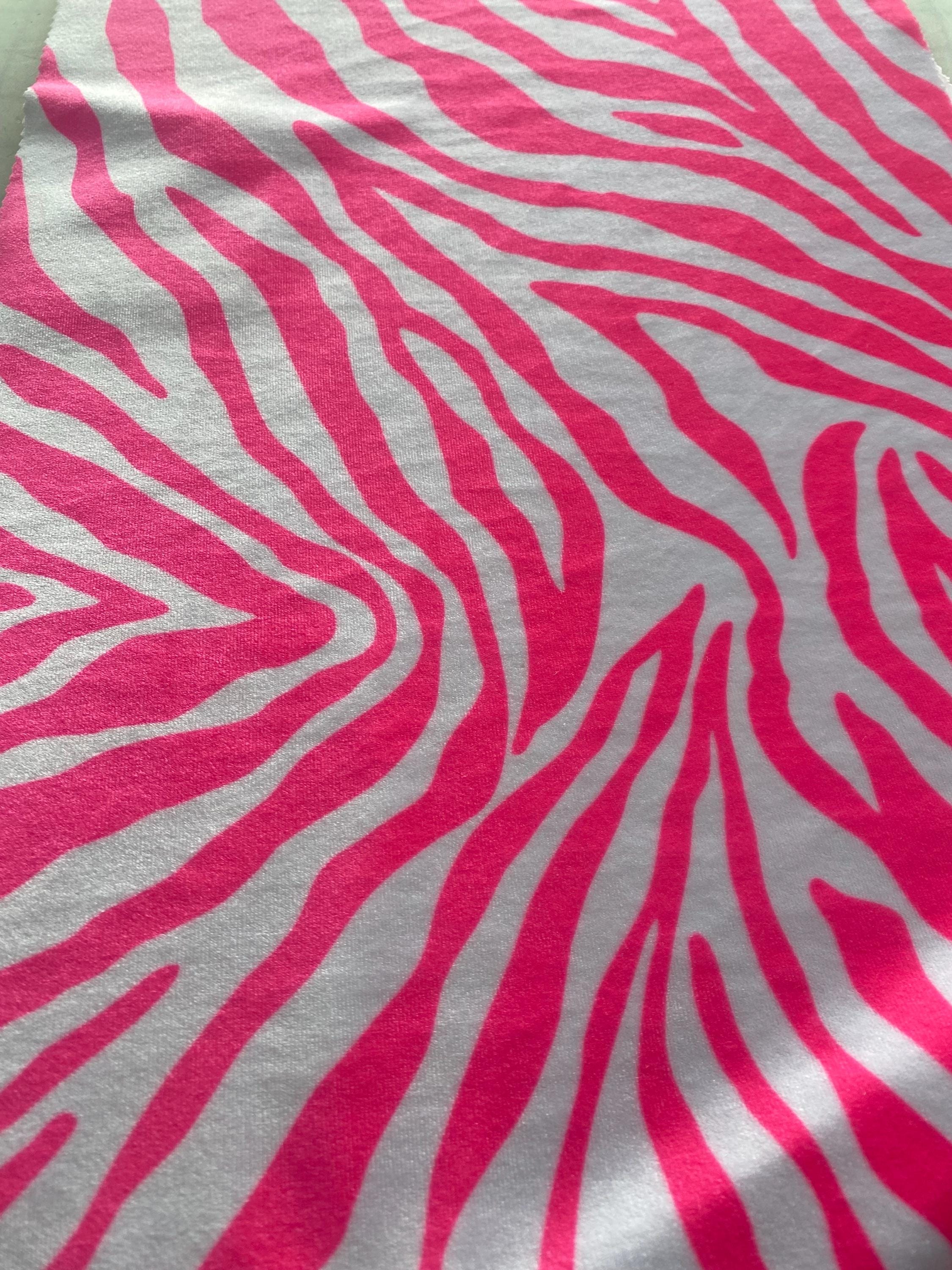 Hot pink on white zebra stretch velvet fabric 58" wide