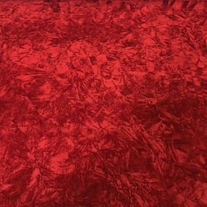 May include: Red crushed velvet fabric with a soft, textured surface.