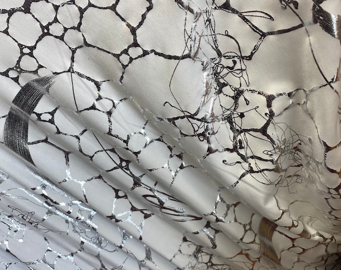 Silver drizzle foil  on white  stretch spandex SOLD BY YARD 60 inches wide