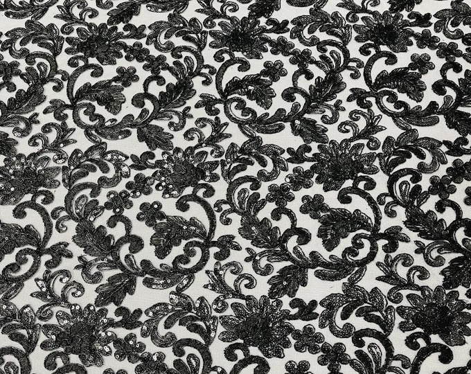 Black metallic corded embroider flowers with sequins on a mesh lace fabric