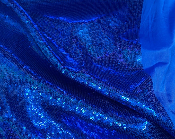 Blue sequins embroidered glitz on stretch polyester spandex base 2-way 58/60” wide