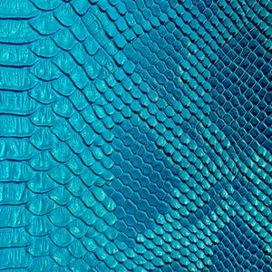 May include: Close-up of a vibrant turquoise snakeskin pattern. The scales are detailed and textured, creating a realistic reptile skin appearance. The color shifts slightly, adding depth to the design. This image is suitable for fashion or craft projects.