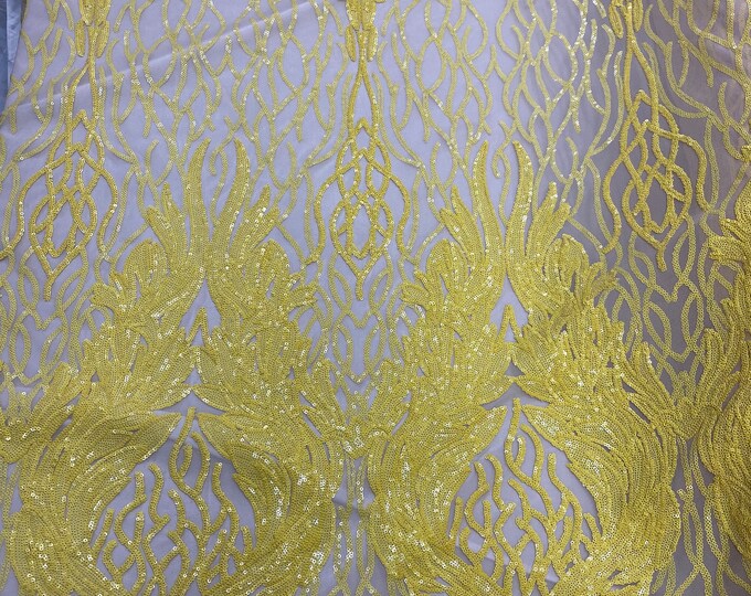 Yellow damask sequin on stretch nude mesh fabirc 54” wide
