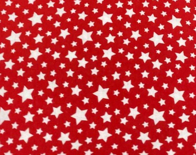 White stars all over on red Poly cotton fabric sold by yard  58" wide