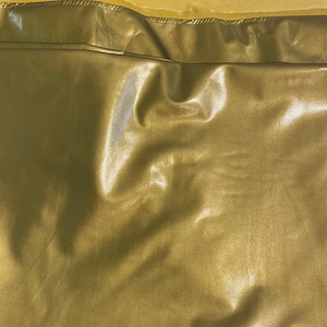 STRETCH Vinyl dark gold Wet Clothing fabric per yard 58” Wide sold by the yard