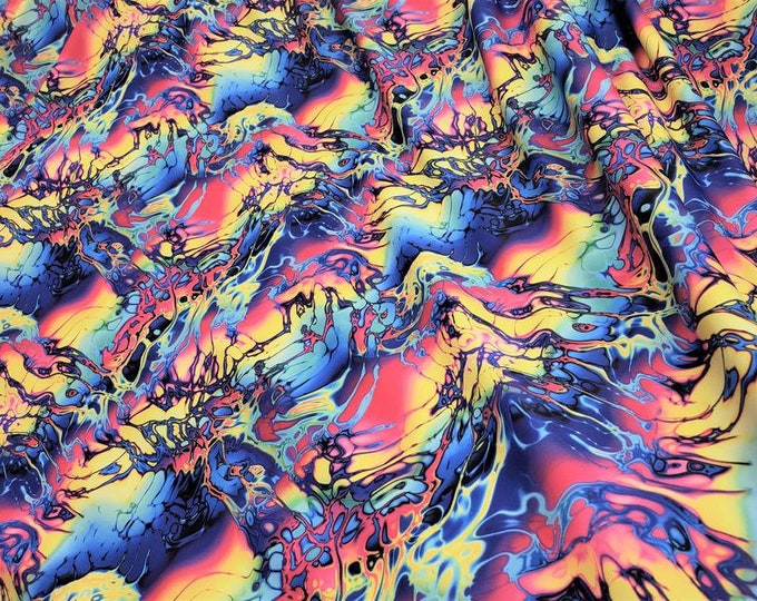 Multi color psychedelic lava Nylon Spandex print fabric. Great for Dancewear, costumes, leggings. Sold by the Yard.
