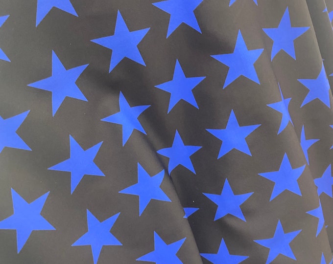 Blue stars black Spandex trixot 4 way stretch fabric 58" wide