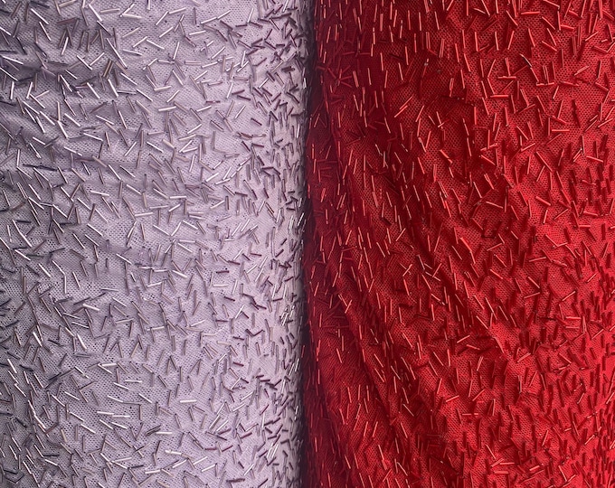 All over pipe work on mesh fabric, 54 inches wide