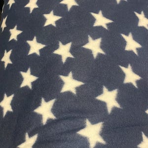 White star on navy fleece fabric By The Yard 60&quot; Wide