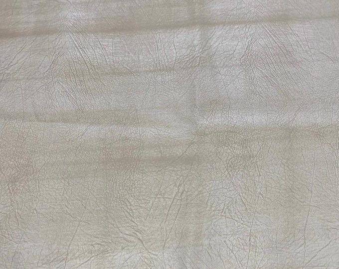 Cream cowboy Distressed look Faux Vinyl upholstery fabric per yard