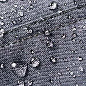 a close up of water drops on a cloth