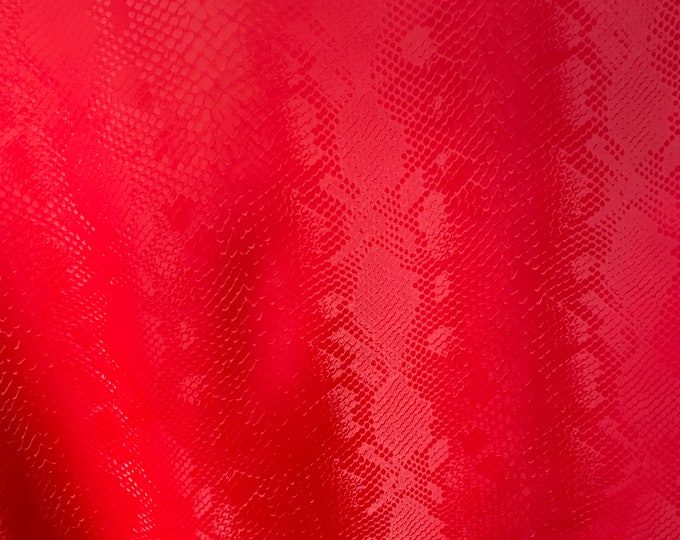 Red matte stretch vinyl fabric costumes, leggings, clothing  Sold by the Yard.