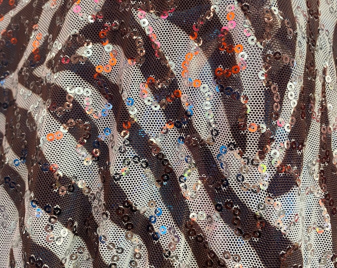 Brown zebra stretch lace with sequins all around 58” wide