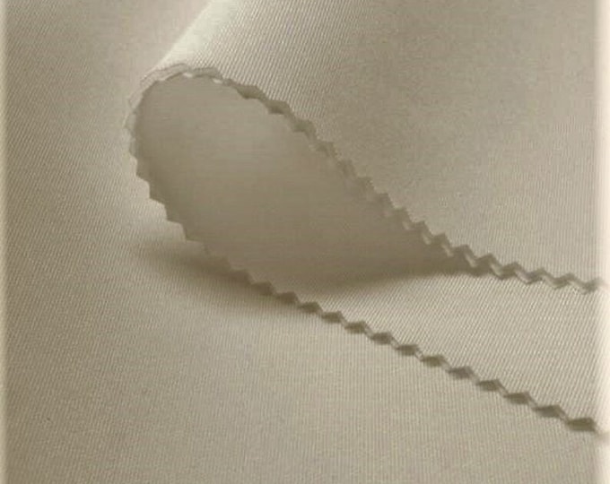 Ivory Neoprene scuba techno fabric by the yard