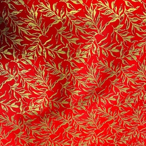 Gold floral on red light weight jacquard fabric by the yard