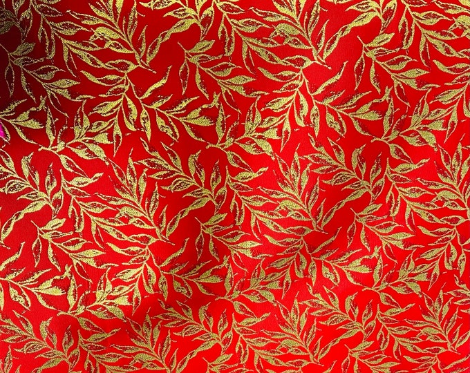 Gold floral on red light weight jacquard fabric by the yard