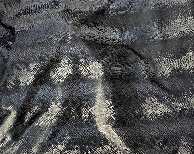 Black matte snake stretch vinyl fabric costumes, leggings, clothing  Sold by the Yard.