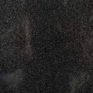 May include: A black background with a fine, sparkly texture. The texture is made up of tiny, silver glitter particles.
