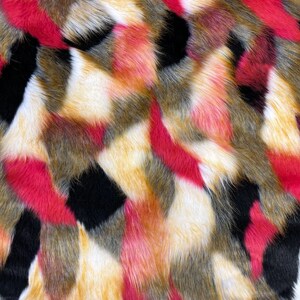 May include: A close-up of a faux fur fabric with a geometric pattern in shades of red, black, white, and brown.