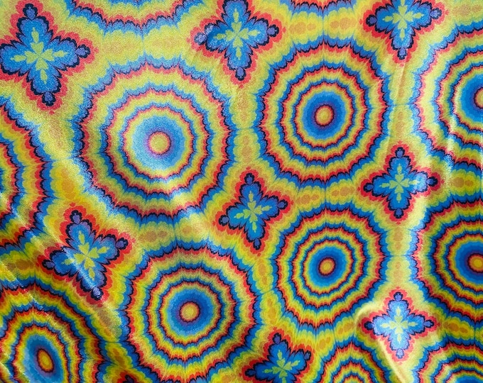 Tie dye blue Multi mystique on yellow stretch Spandex Fabric sold by the yard