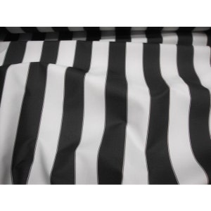 May include: Close-up of a fabric with a bold black and white striped pattern. The stripes are vertical and evenly spaced, creating a classic and graphic design. The fabric appears to be smooth and possibly a medium weight.