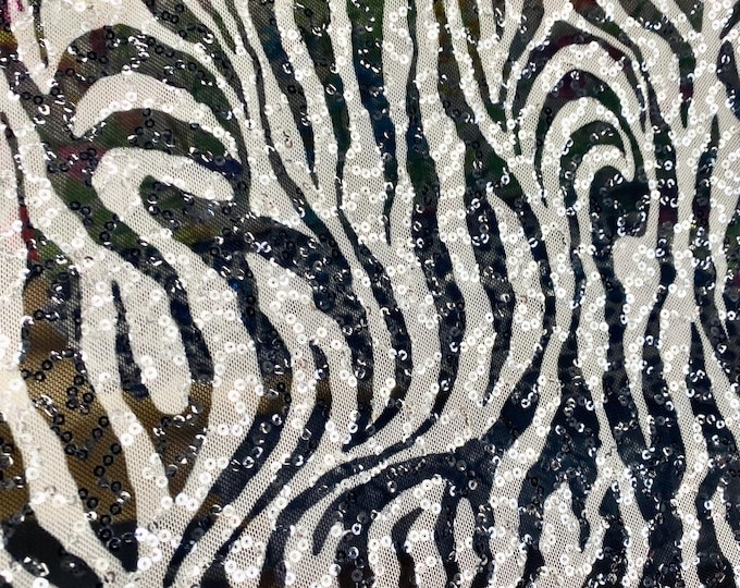 Zebra black and white stretch lace with sequins all around 58” wide