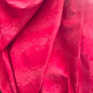 Fuchsia matte stretch vinyl fabric costumes, leggings, clothing  Sold by the Yard.