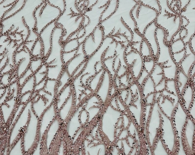 Blush pink Vine with heavy beading on a mesh lace-sold by the yard.