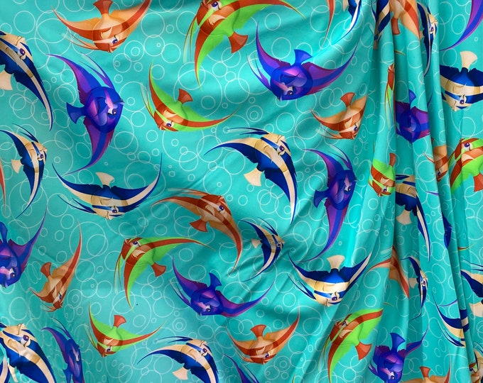 Turquoise stretch spandex with sea fish  fabric SOLD BY YARD 60 inches wide