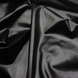 Black Solid Nylon Spandex Fabric 4-Way Stretch 60" Wide – By The Yard