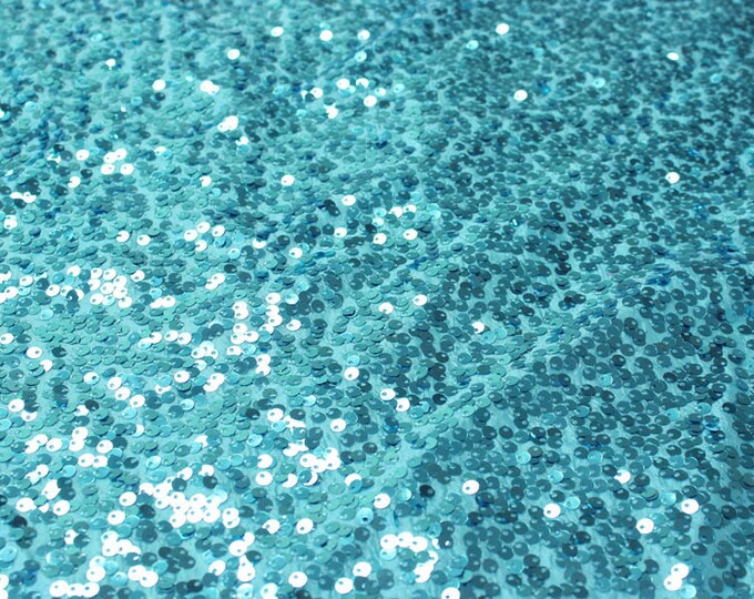 Aqua seqiun on taffeta fabric 56” wide sold by the yard