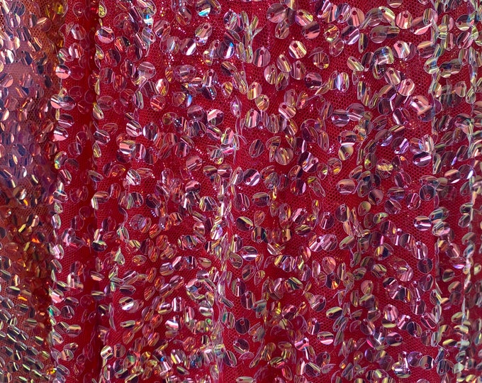 Red iridescent shiny sequins on a 2 way stretch White velvet , sold by the yard