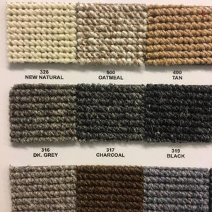 May include: A color chart for carpet samples. The chart shows nine different carpet samples in various colors, including new natural, oatmeal, tan, dark grey, charcoal, black, grey, brown, and blue. The chart is labeled with the color name and a number for each sample.