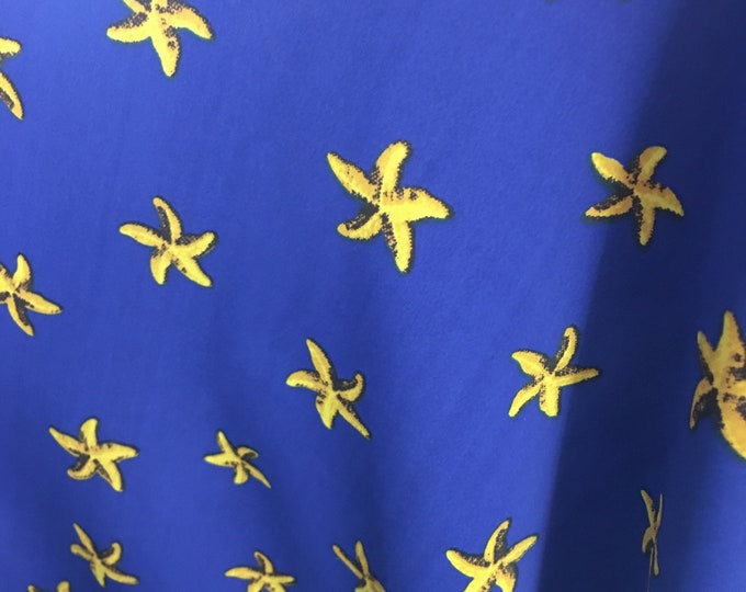 Yellow Starfish on Royal Blue Background Nylon Spandex Fabric