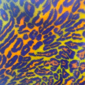 Orange / Yellow Multi colored Leopard Spotted shaggy short pile faux fur fabric by the yard