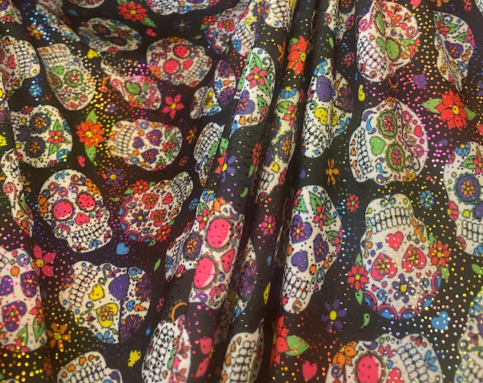 skull glitter on black Spandex fabric 60" by the yard