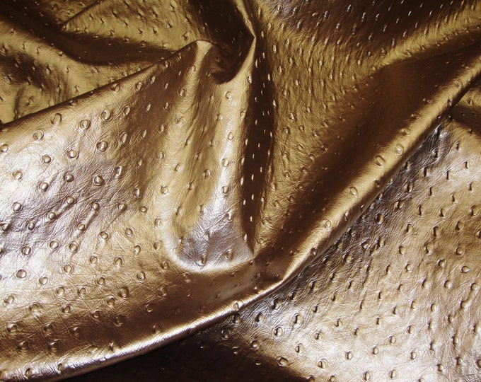 Vinyl faux leather Penny Metallic Ostrich Upholstery fabric per yard