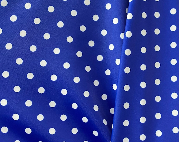 White polka dot on royal 4 way stretch spandex fabric,  SOLD BY YARD 60 inches wide