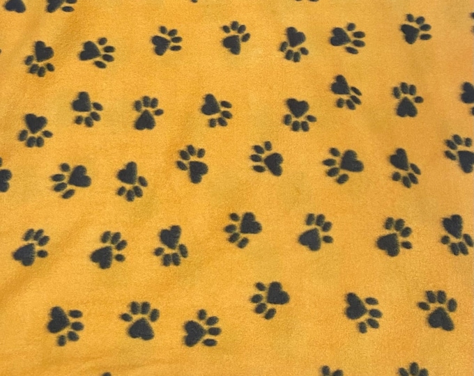 Black paws on yellow Fleece By The Yard 60" Wide